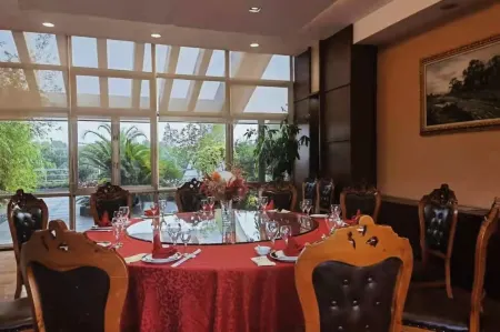 Wistaria Hotel Отели рядом с достопримечательностью «Hydrophyte Garden （South Gate）»