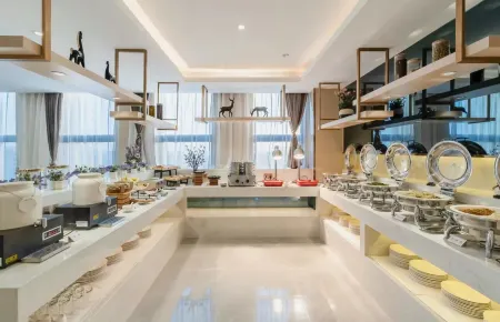 Huasheng Hotel (Haikou Yilong West Road Qilou Old Street Branch) Отели рядом с достопримечательностью «Hainan University(Haidian Campus)»