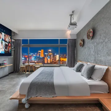 Qimen Theme Hotel (Jiefangbei Hongyadong Shop) Отели рядом с достопримечательностью «Jiefangbei Pedestrian Street»