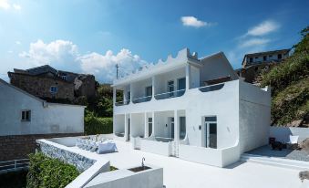 Casa Milà Homestay, 동지섬