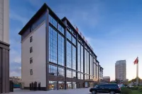 Junyang Hotel (Aksu Railway Station Old Street Night Market) Hotels near Jingong Folk Custom Garden
