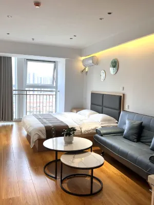 Yuechengju Apartment (Rizhao China Resources Vientiane Huijinhui Times Square Branch)