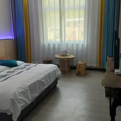 Hexiangju Homestay (Deqin Shengping Town) โรงแรมใกล้จุดชมวิวด้านบนหมอกหนา