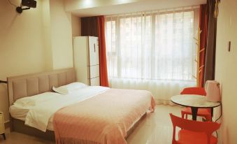 Yanji Songzi Apartment (Yanbian University Network Red Wall Shop)