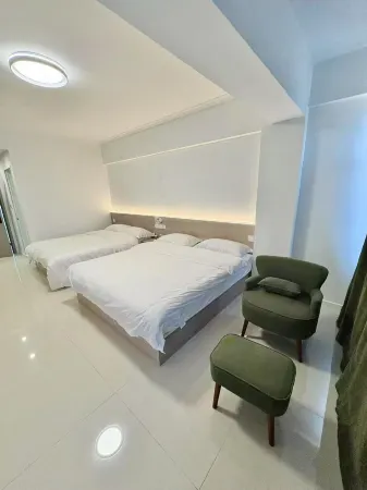 Zhangkeyi Apartment Отели рядом с достопримечательностью «Three Reef Range Rover»