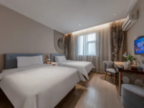 สาขาโฮมอินน์นีโอ ซินชิโข่ว เมืองแว่นตา สถานีรถไฟตันหยาง โรงแรมในตันหยาง