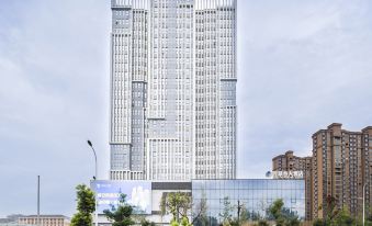 FCG  SUITES  BY  NEQTA