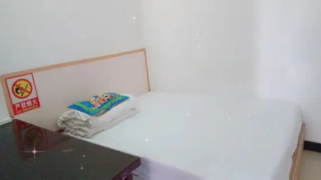 Zhongyuan Hotel Отели рядом с достопримечательностью «Kangpingxian Library»