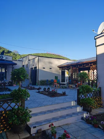 Shanyuju Homestay Отели рядом с достопримечательностью «Kurding Tourism and Cultural Museum»