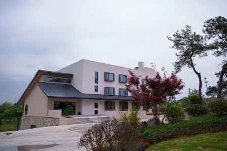 Lüyin Dongyu Hezhu Отели рядом с достопримечательностью «Mulan Grassland»