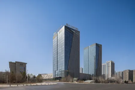 Wanda Moments, Urumqi Railway Station Отели рядом с достопримечательностью «Xinjiang Institute of Engineering»