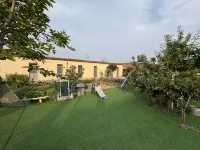Mijia Dayuan Homestay (Kenli Huanghekou Hospital)