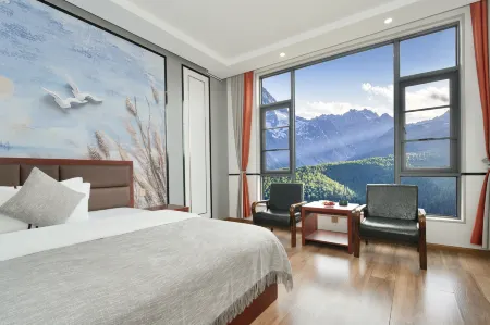 Deqin Moshang Huakai Boutique B&B Отели рядом с достопримечательностью «Wunongding Viewing Platform»