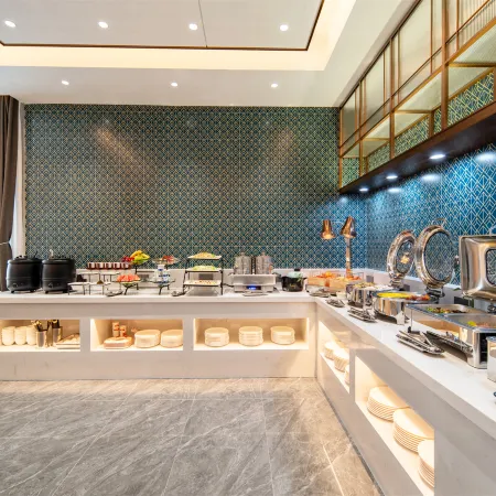 Magnotel Hotel (Taian Xintai Qingyun Shopping Center Jindou Road)