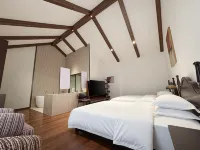 Camel Bell World Cabin Hotel - badewanne