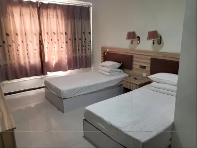 哈密方圓賓館 鄰近新疆生產建設兵團第十三師新星市博物館的酒店