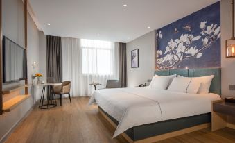 Magnolia Hotel (Peixian Lingchuang International Plaza Red Star Macalline Branch)