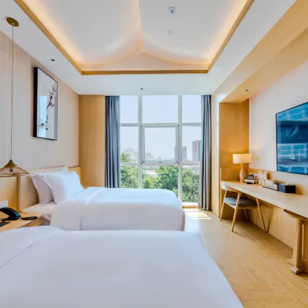 Jianguo Puyin Hotel (Qingdao Wusi Square Qingdao University Branch) Отели рядом с достопримечательностью «Циндао-Восточный Университет»