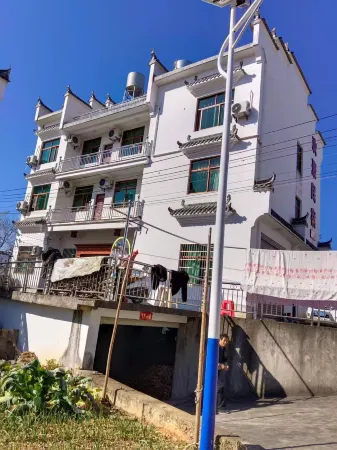 Huanju Homestay (Shui Ink Shanghe Branch) Отели рядом с достопримечательностью «Shui Mo Shanghe Scenic Area»