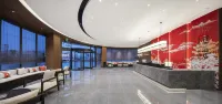 Qianna Hotel (Honor New World Shopping Center Longhu Park Branch) Hotels in Xixian