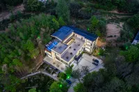 Huoshan Mansu Zhuning Creek Language Homestay