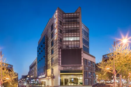 Orange Hotel Отели рядом с достопримечательностью «Northwest University of Technology (Taicang Campus)»