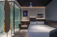 IMMERSING Hotel (Haikou XinBu Island Bihai Yintan Branch) Hotel a Haikou