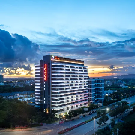 Ramada Encore By Wyndham Jiusuo Down Town Отели в г. Ледун