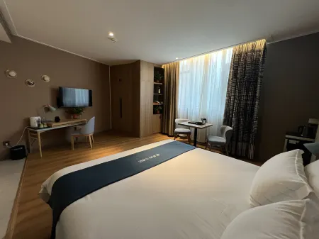 Shoulvrujia Pebble Hotel (Tangyin Shangyi Plaza Renmin Road) Отели в г. Танъинь