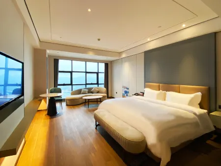 Yunyi Hotel Lugu Lake Отели рядом с достопримечательностью «Anhui Normal University Qijiang College (Wenjin Campus)»