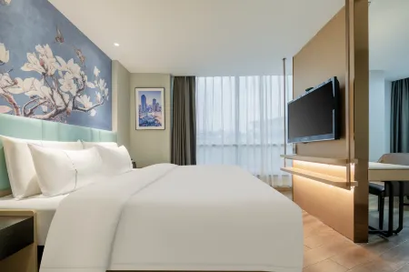 Magnotel Hotel (Ezhou Yintai Baihuo Nanpu Road) Отели рядом с достопримечательностью «Ezhou Polytechnic (Southeast to Fenghuang Subdistrict Office Lianhuashan Community Health Service Station)»