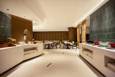 Mehood Lestie Hotel (Foshan Nanhai Xinduhui Dali Pedestrian Street Branch) Отели рядом со станцией Foshan West Railway Station