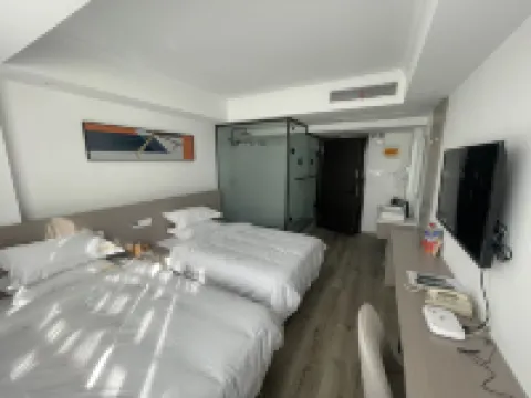 Guannan Qianxin Business Hotel