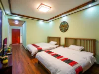 Jinghong Mankuang Daijia Chinese Inn โรงแรมใกล้สวนมันตง