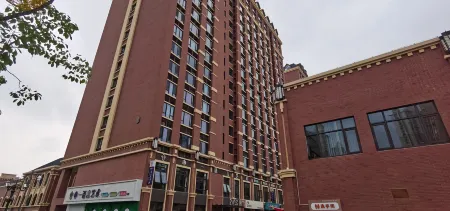 Meilu Yiju Apartment (Zhangjiagang Meilin Square Branch) Отели рядом с достопримечательностью «Zhangjiagang Campus， the City Vocational College of Jiangsu (Binjiang Avenue)»