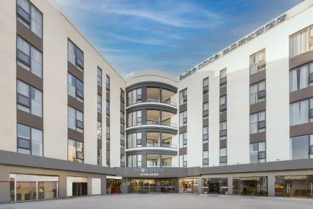 Suisse Place Caohejing Shanghai Отели рядом с достопримечательностью «Huadongligong University (xuhuixiaoqu)»