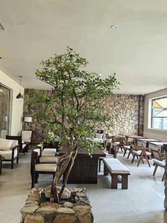 Litang Huaxi Yungu Hotel (Ririjia Village) Отели рядом с достопримечательностью «Xiazetong Village»