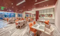 Tonino Lamborghini Hotel Kunshan City Center Отели в г. Куньшань