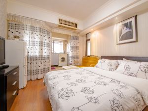 Xinjia Business Apartment Hotel