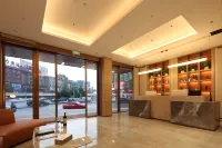 Unitour Hotel (Loudi Liangang Wolmart)