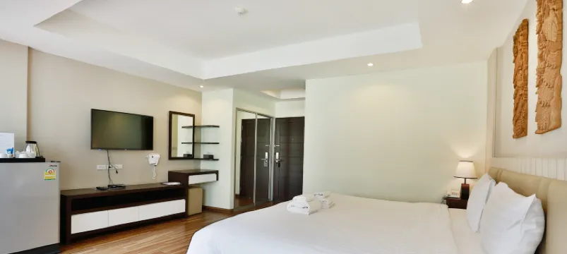 ห้องเอ็กเซ็กคูทีฟเตียงคิงไซส์พร้อมวิวสระว่ายน้ำ