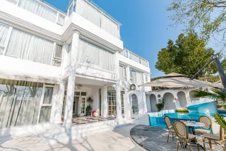 Shanghai ruochu designer Guesthouse Отели рядом с достопримечательностью «Shanghai Wild Animal Park»