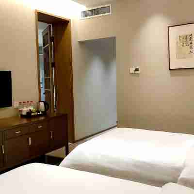 Qinhuangdao Four Arts Hotel Rooms