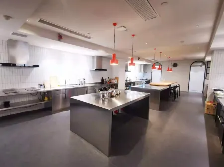 baseLITE HUANGXING Serviced Apartment Отели рядом с достопримечательностью «Shanghai Open University Yangpu Branch School»