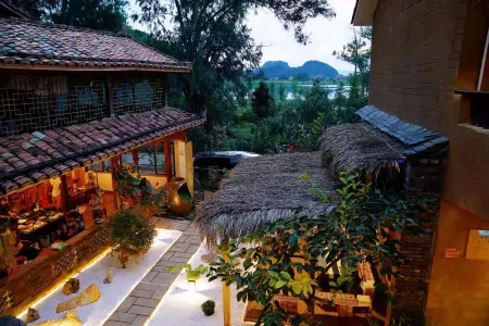 Puzhehei Guanhu Su Отели рядом с достопримечательностью «Fairy Cave»