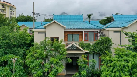 Shiguang Xiaozhu Hotel Отели рядом с достопримечательностью «Nan'en Waterfall»