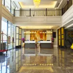 Vienna Hotel （Xinhe Yixing Building Hotel） Hotels in Xinhe