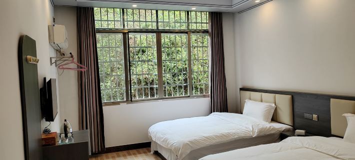 Qingyun Guesthouse Hotele w: Autonomiczny Powiat Zhenning Buyei i Miao