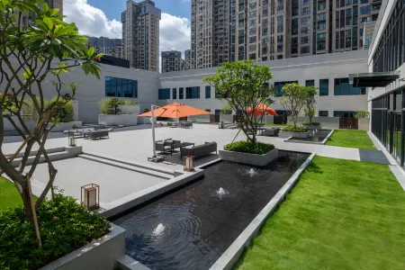 Huaxuanli Hotel (Shenzhen Universiade Center) Отели рядом с достопримечательностью «Baoneng All City Shopping Center Longgang Branch (Jianshe Road)»