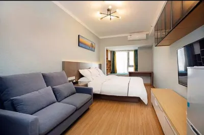 Muxin Hotel (Zhengzhou Meijing Longmen Qilihe Subway Station) Hotels near Fu Tower